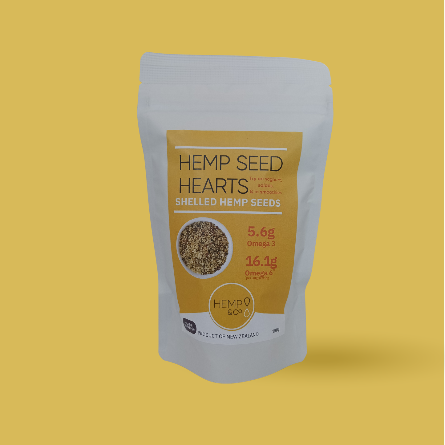 Packaging of 180g Hemp Seed Hearts on a yellow background
