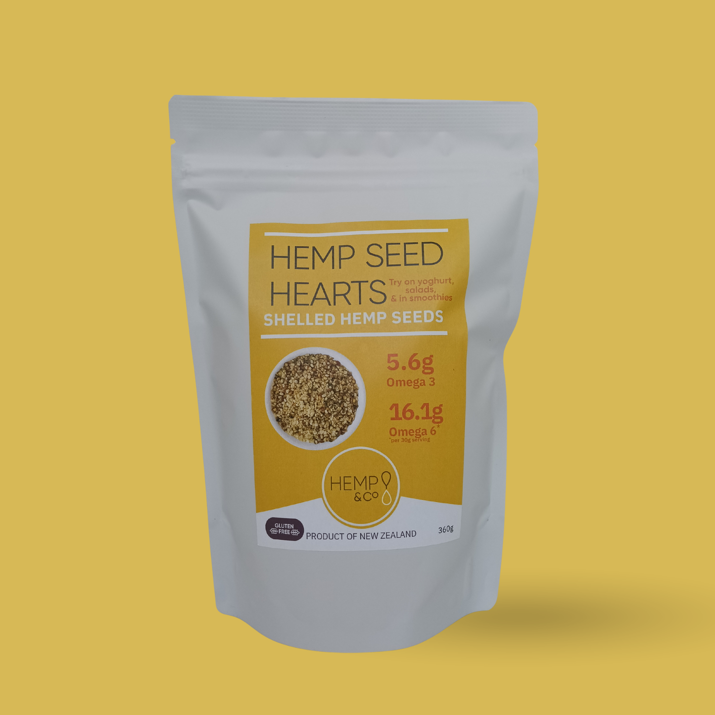 Packaging of 360g Hemp Seed Hearts on a yellow background