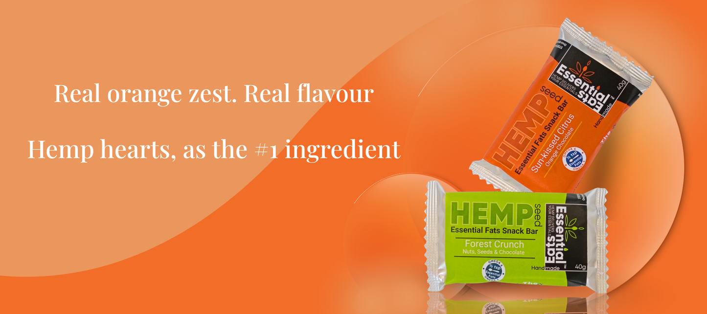 Two hemp heart bars on an orange background with text about real orange zest and flavor.